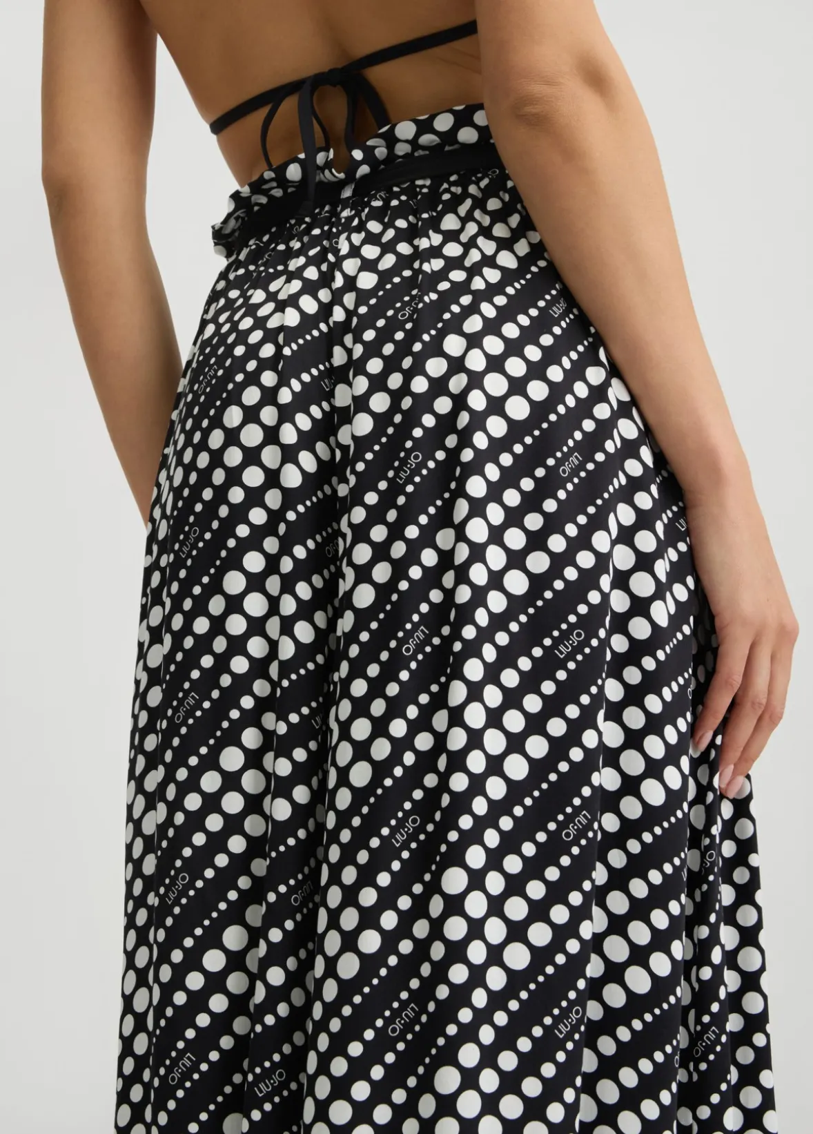 Pantaloni con stampa a pois