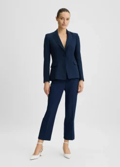 Pantaloni cropped con piega
