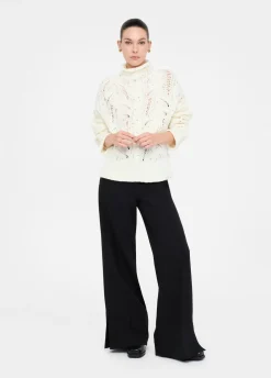 Pantaloni flare con spacchetti