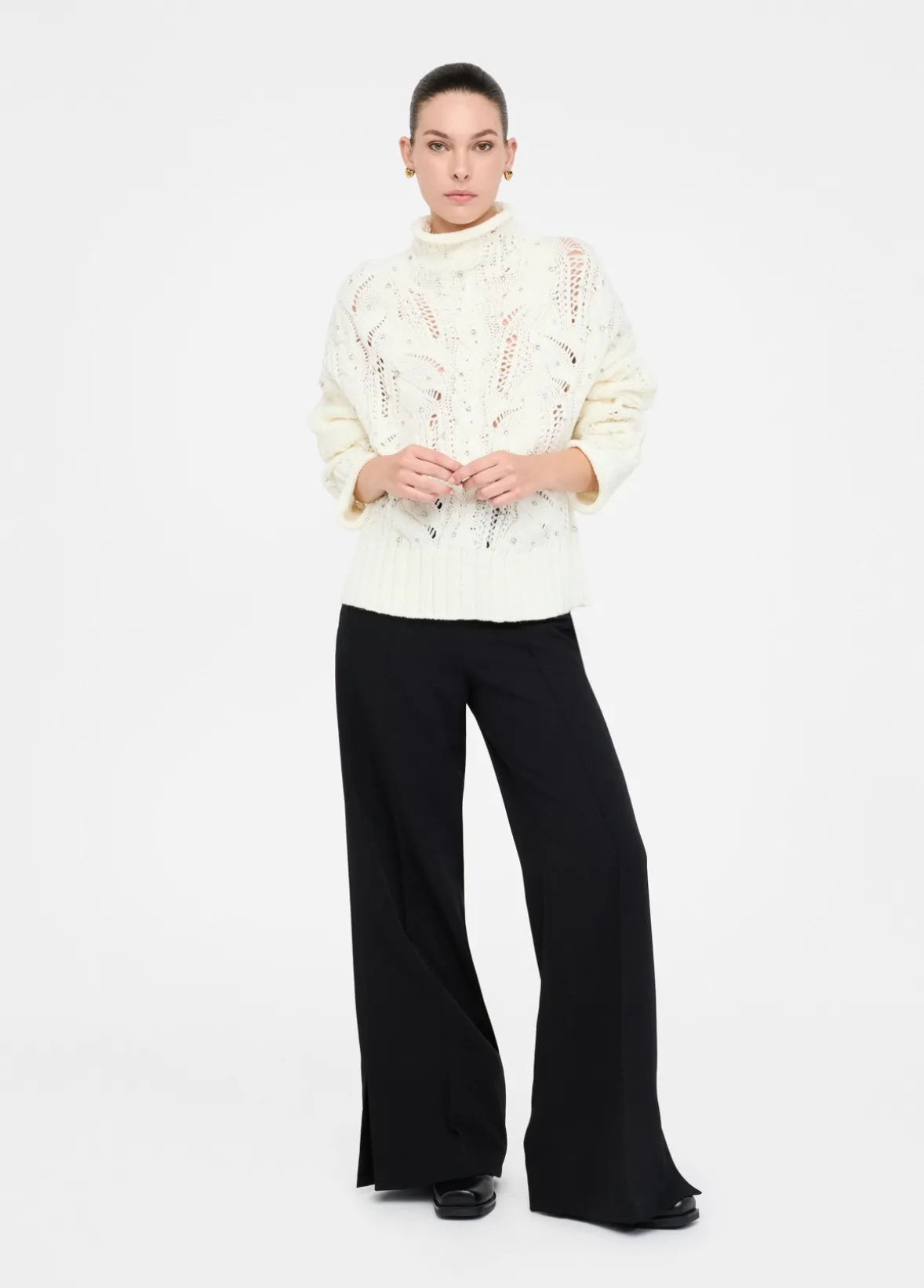 Pantaloni flare con spacchetti
