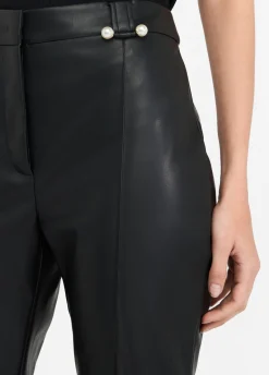 Pantaloni flare in tessuto spalmato