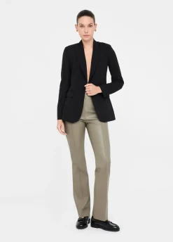 Pantaloni flare in tessuto spalmato
