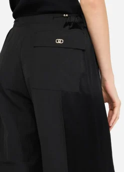 Pantaloni jogging in nylon e raso