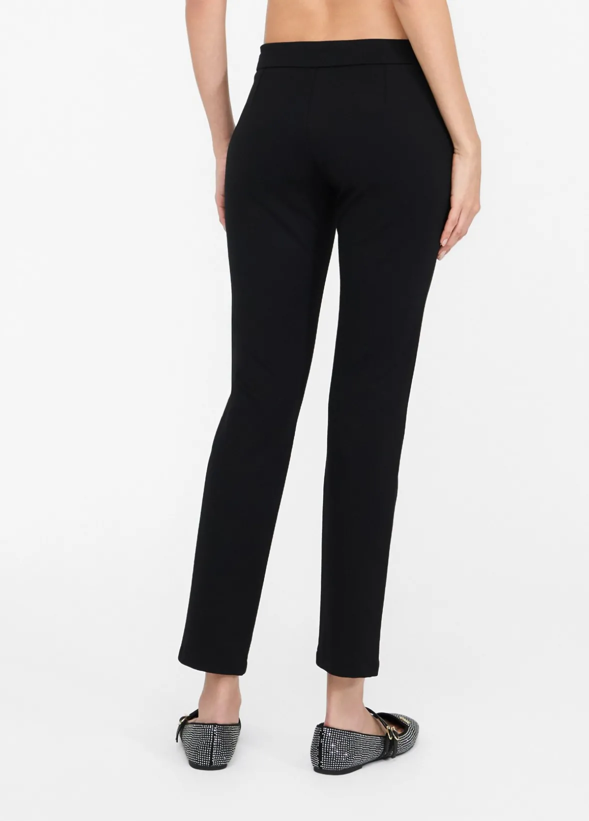 Pantaloni skinny con bottoni