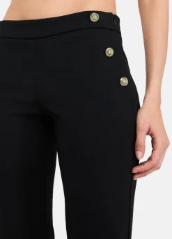 Pantaloni skinny con bottoni