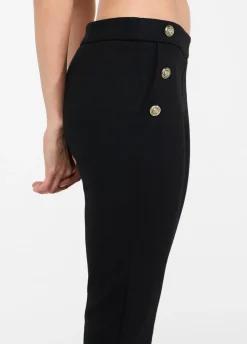 Pantaloni skinny con bottoni