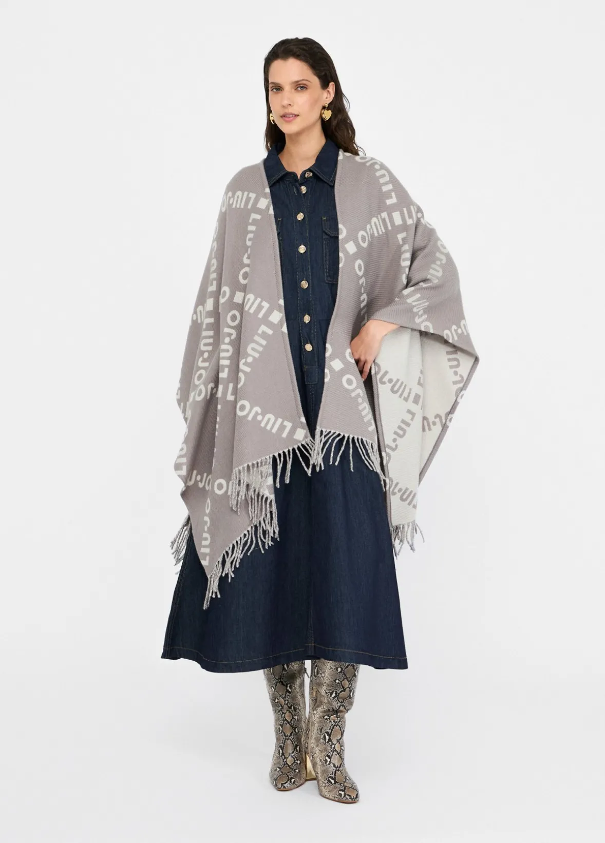 Poncho con logo e frange