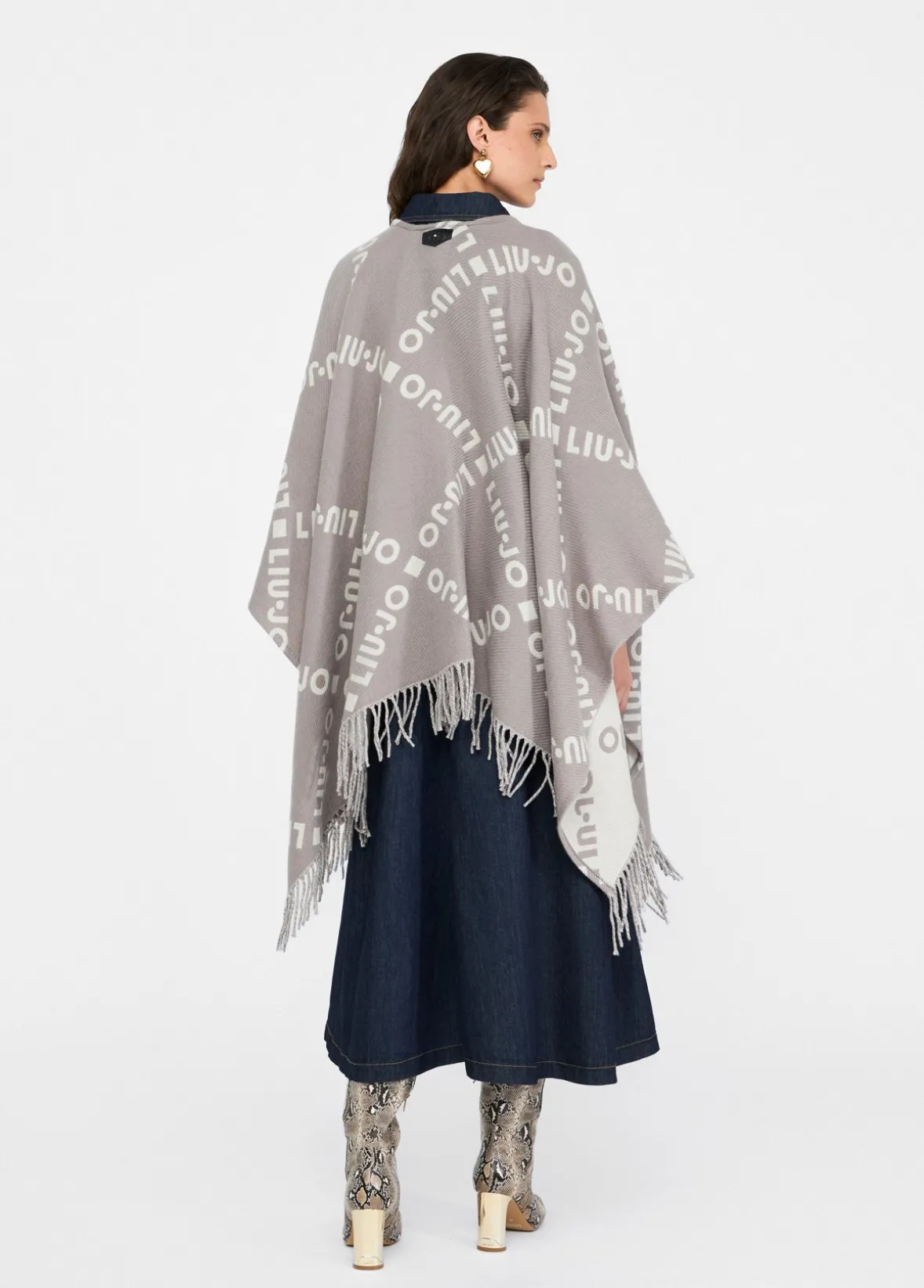 Poncho con logo e frange