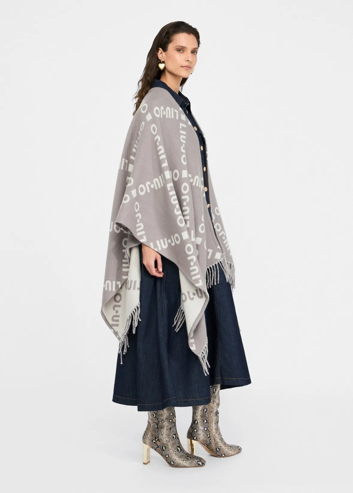 Poncho con logo e frange