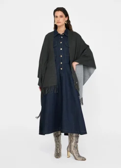 Poncho con logo e frange