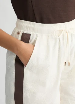 Short in cotone con ricami