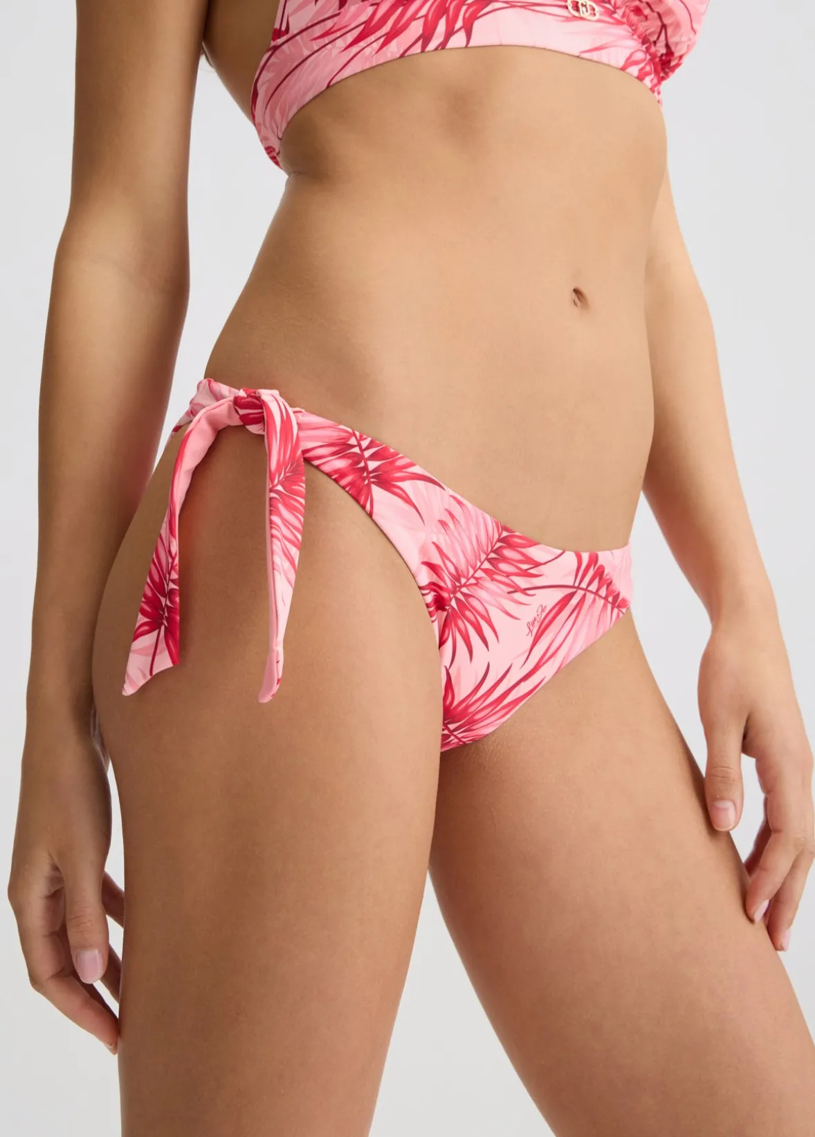 Slip da mare con stampa palme