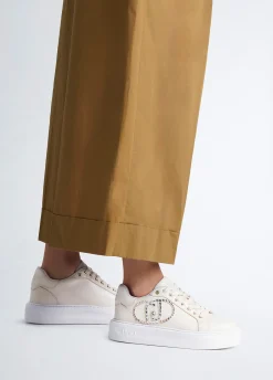 Sneakers con logo gioiello
