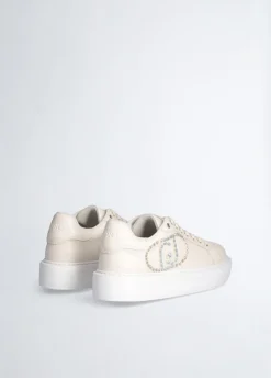 Sneakers con logo gioiello