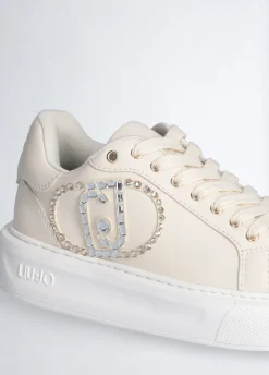 Sneakers con logo gioiello