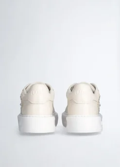 Sneakers con logo gioiello