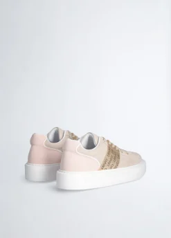 Sneakers con logo traforato