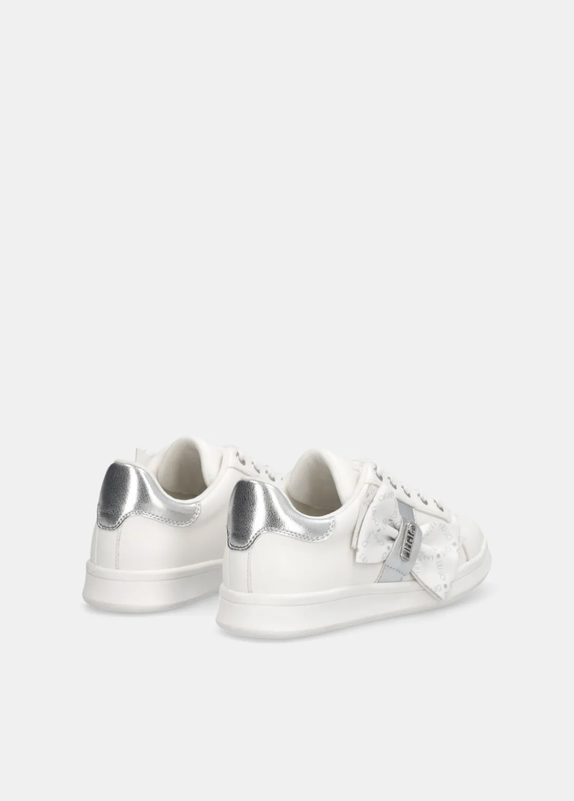 Sneakers con maxi fiocco