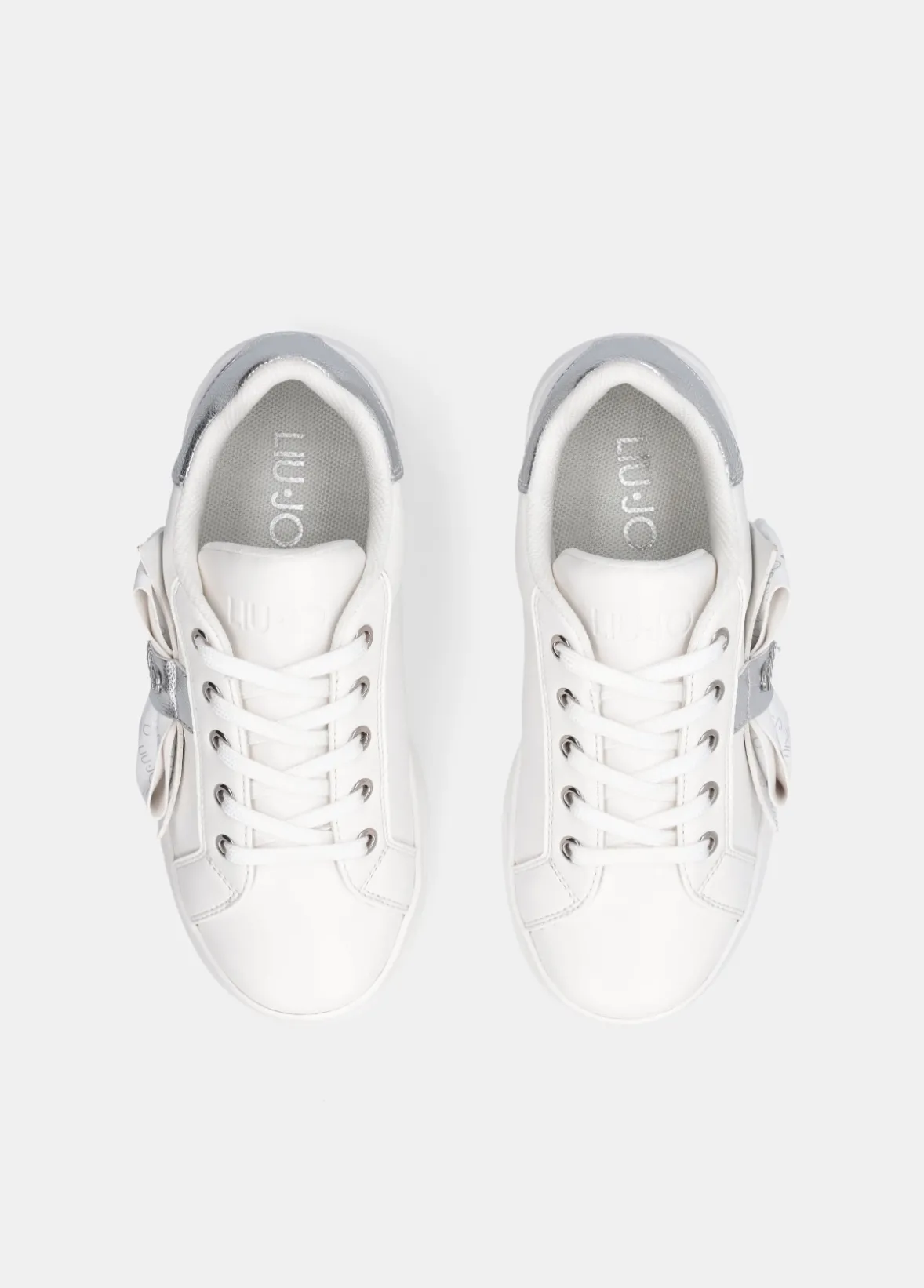 Sneakers con maxi fiocco