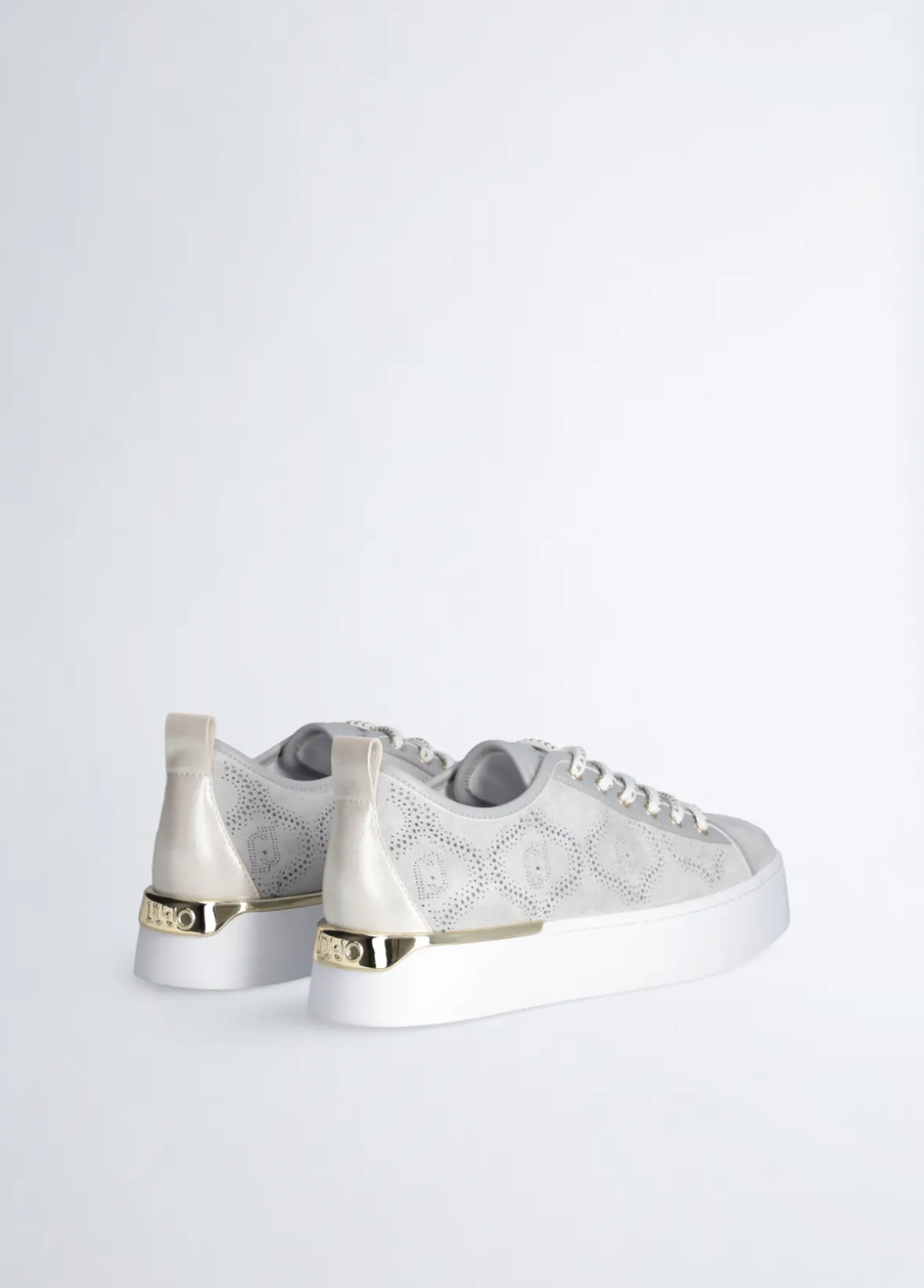 Sneakers con trama traforata