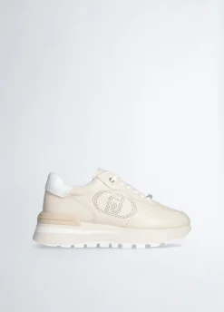 Sneakers in pelle con logo traforato