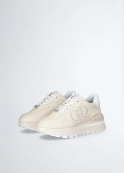 Sneakers in pelle con logo traforato