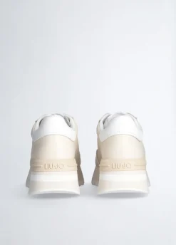 Sneakers in pelle con logo traforato
