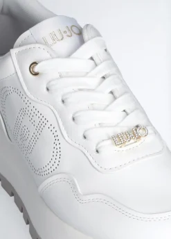 Sneakers in pelle con logo traforato