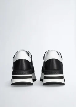 Sneakers in pelle con logo traforato