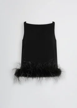Top elegante con piume