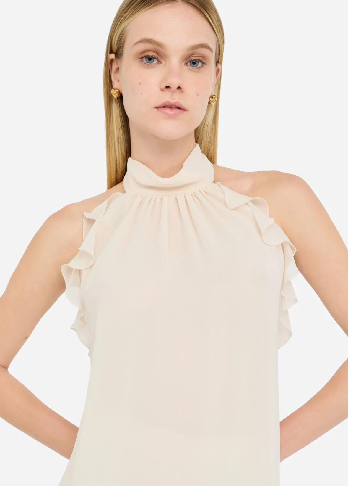 Top elegante con rouches