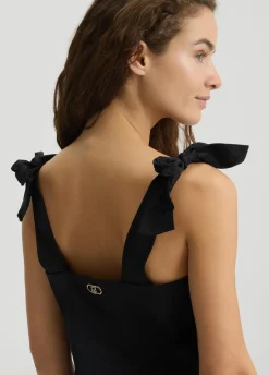 Top in cotone con fiocchetti