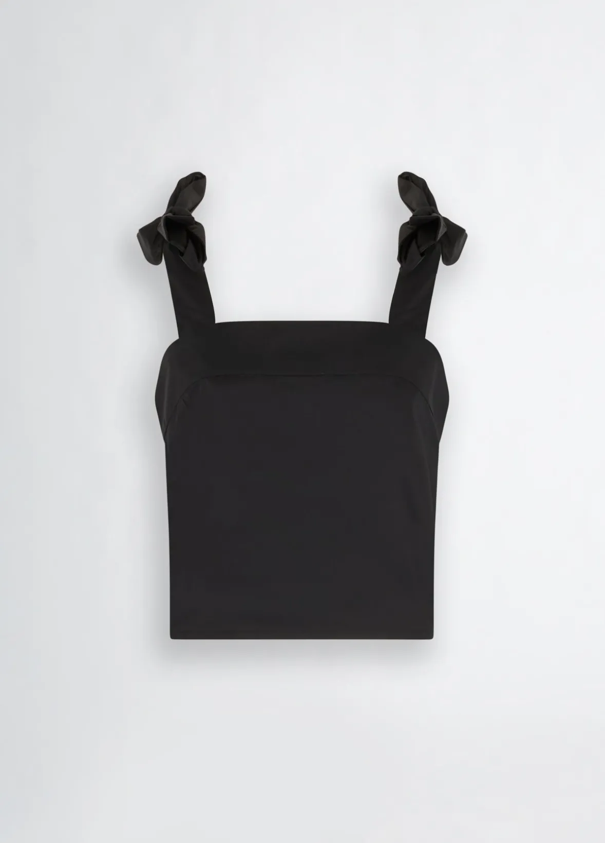 Top in cotone con fiocchetti