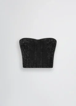 Top in denim con strass
