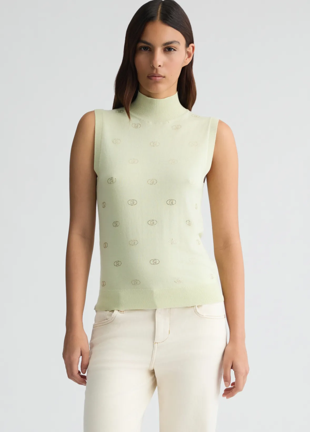 Top in maglia con logo e strass