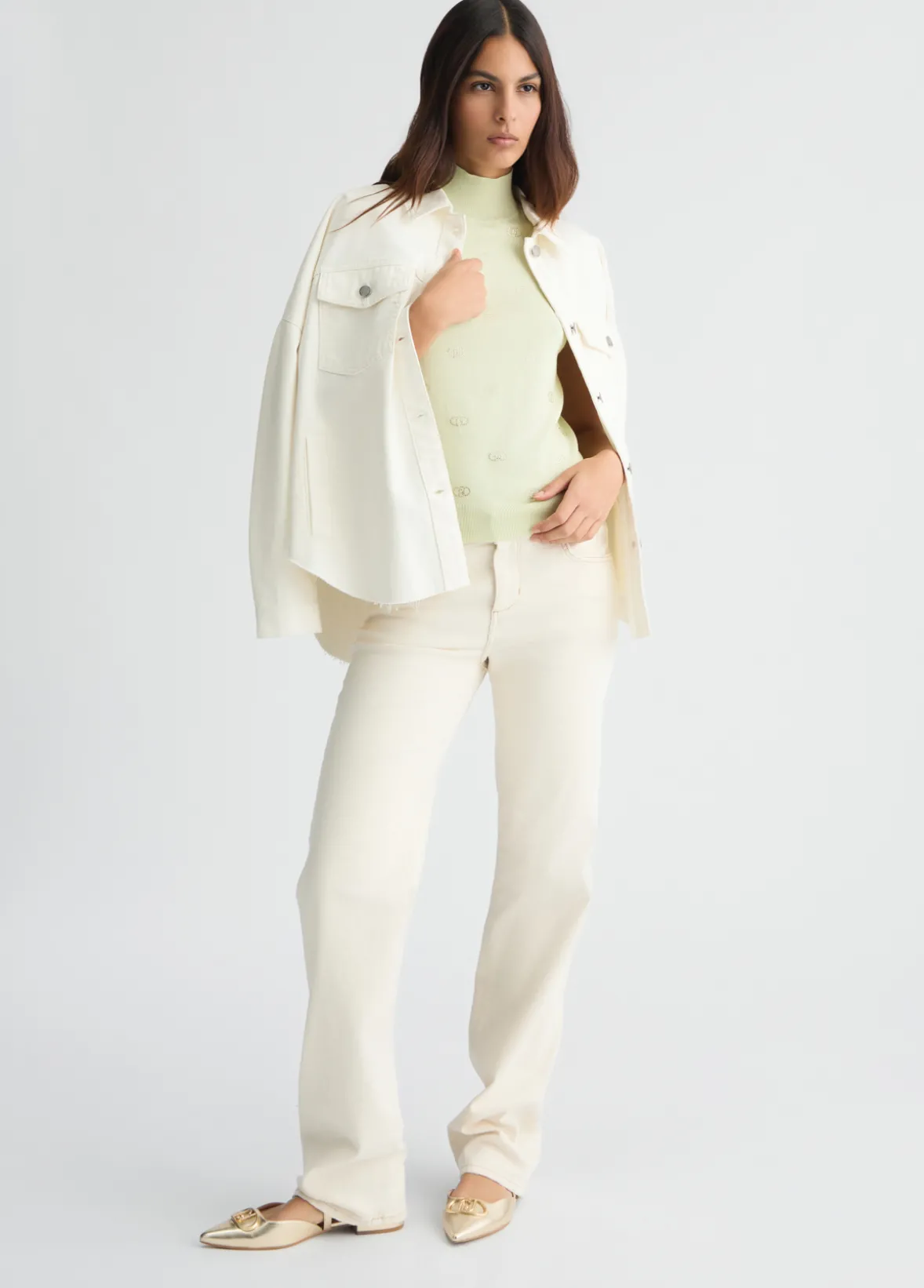 Top in maglia con logo e strass