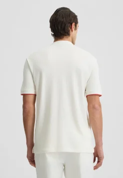 T-shirt con bottoni