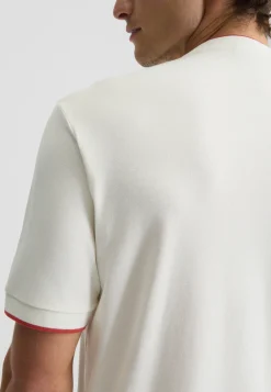 T-shirt con bottoni