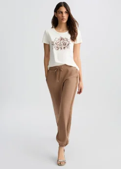 T-shirt con logo animalier e strass