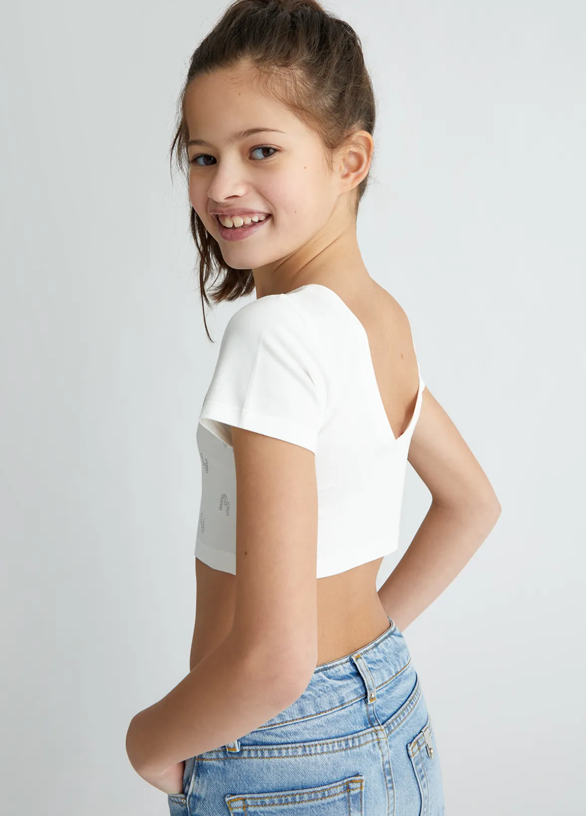 T-shirt con logo e strass