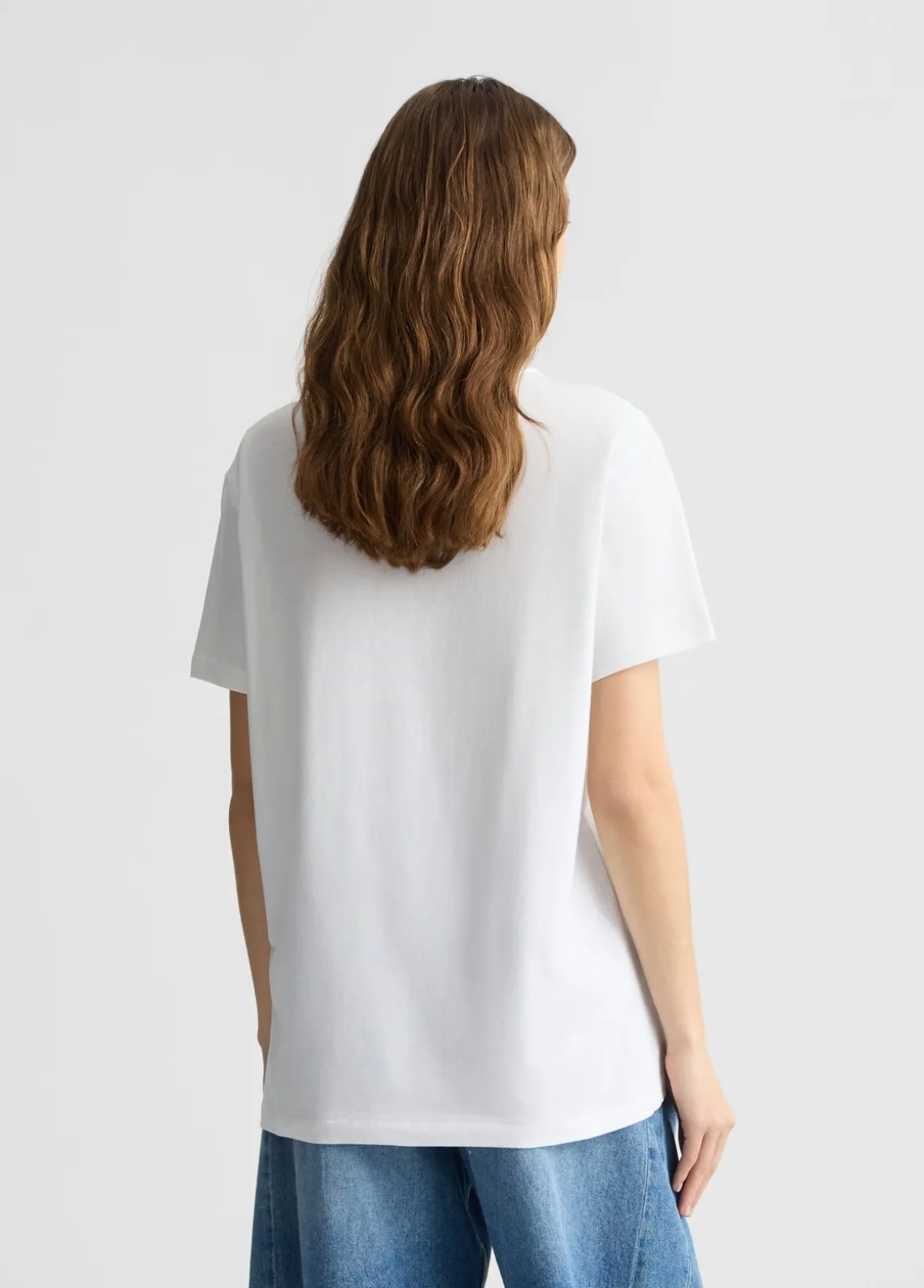 T-shirt con stampa e strass