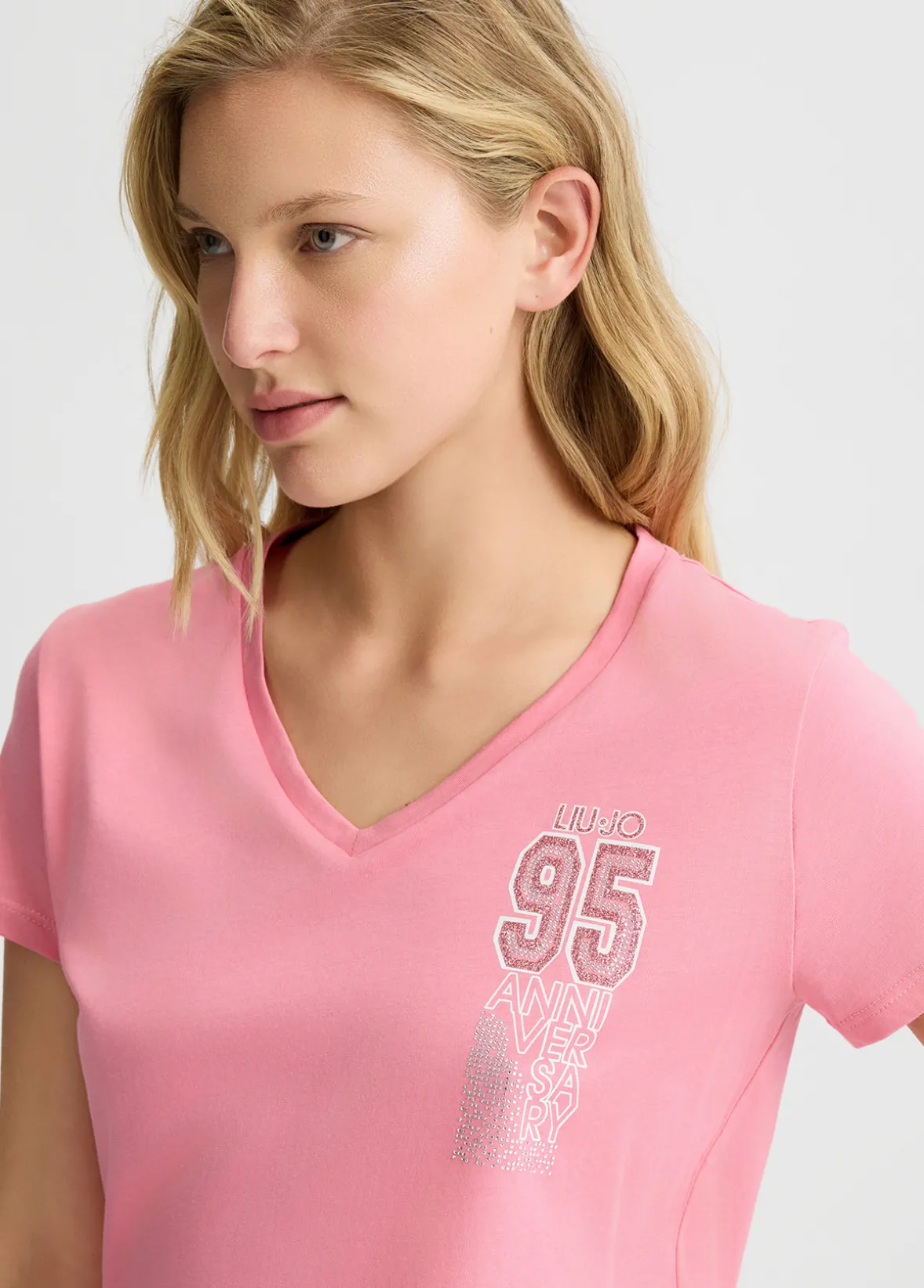 T-shirt con stampa e strass
