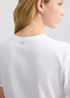 T-shirt in cotone con ricamo e strass