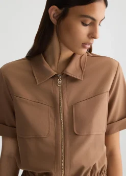 Tuta corta con zip