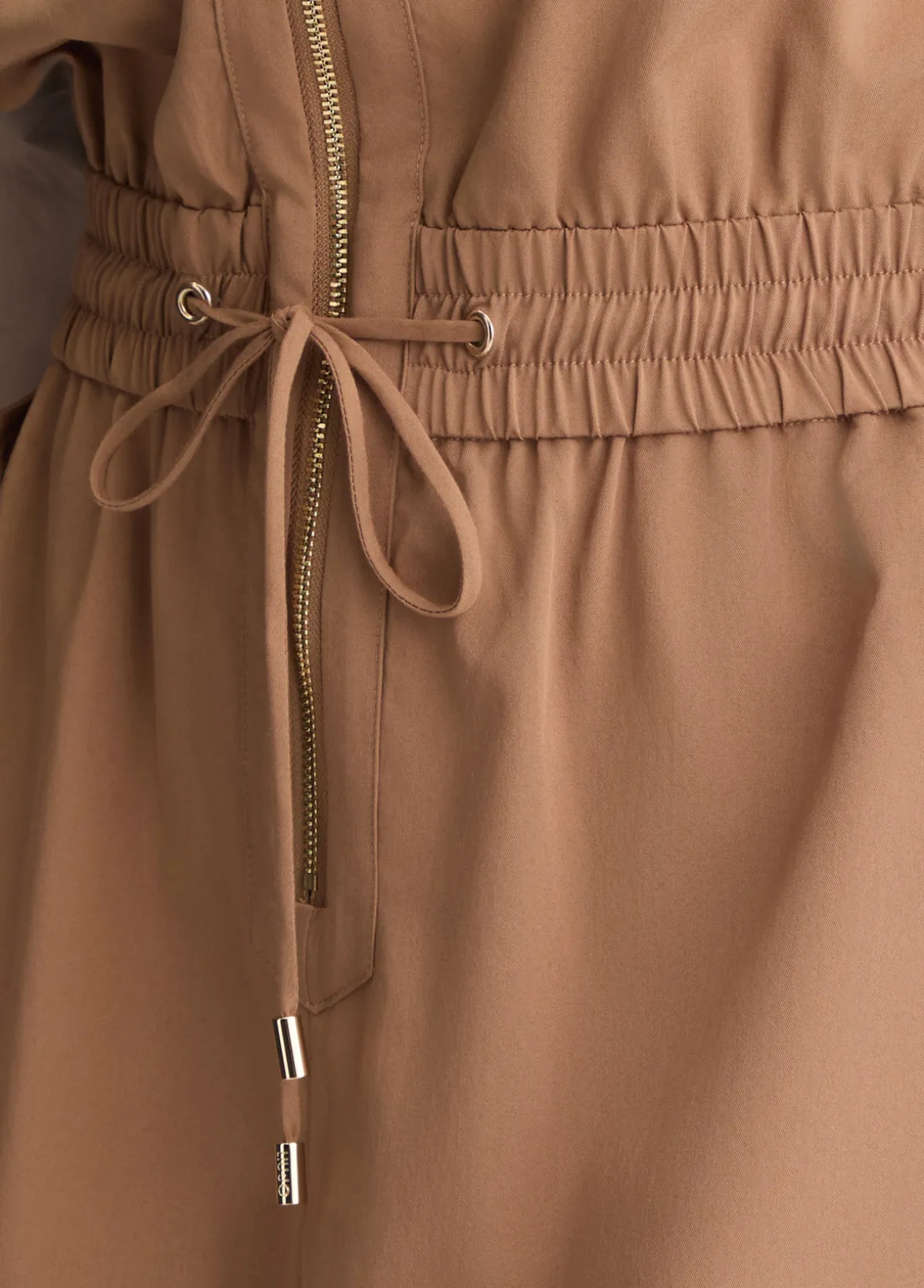 Tuta corta con zip