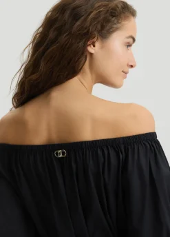 Vestito corto con spalle scoperte