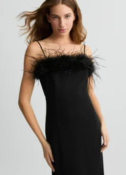 Vestito elegante con piume