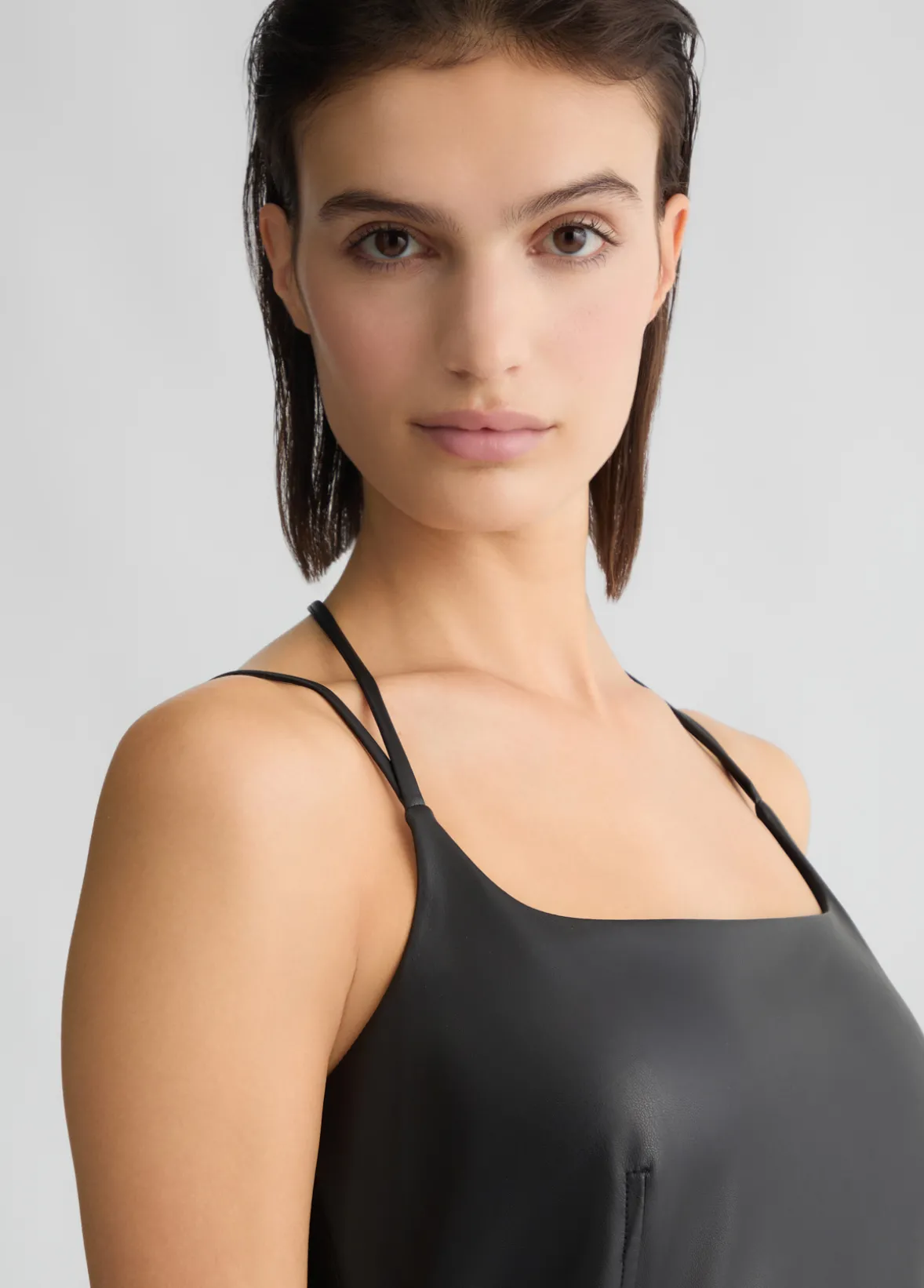 Vestito in tessuto spalmato